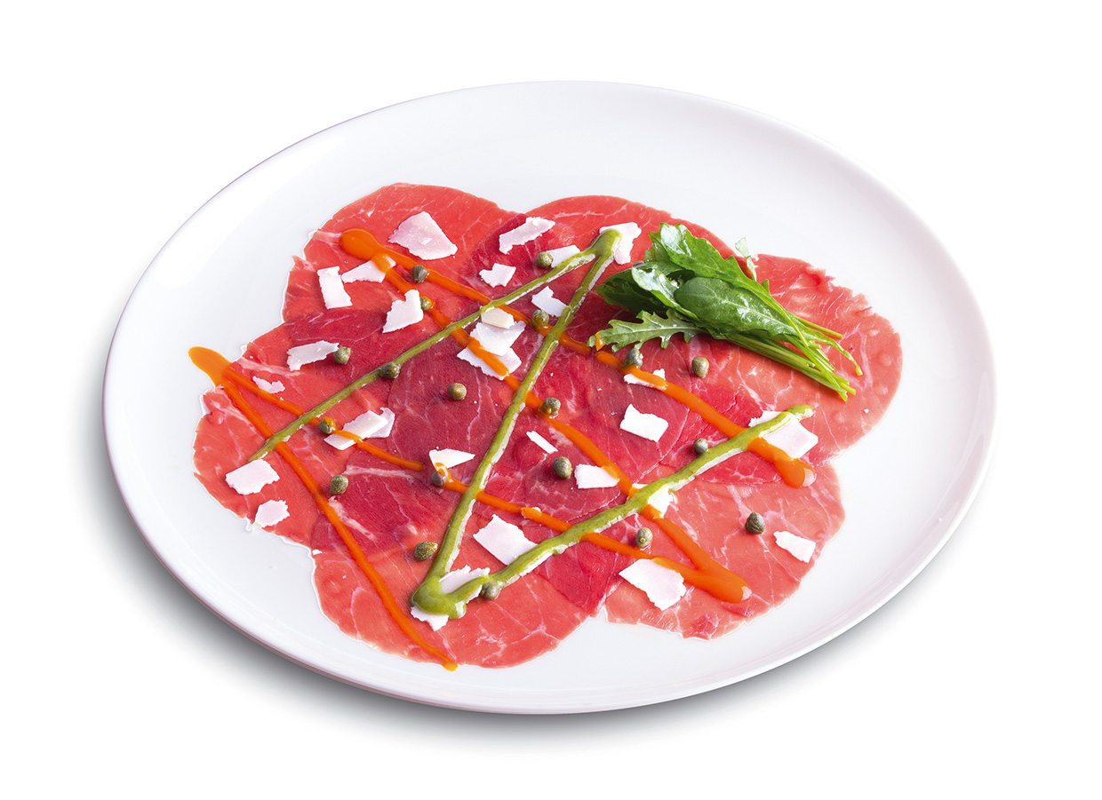 Beef Carpaccio and its mishmash of parmesan, caper, rocket salad, drizzled with orange and meadow green coulis